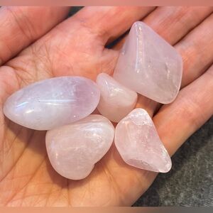 5 pieces of rose quartz, varying sizes and shapes, all natural, polished pieces